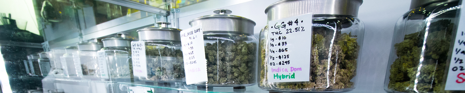 Shelf with jars of cannabis