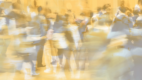 Crowd of people in the mall at high speed during the busy Black Friday shopping time