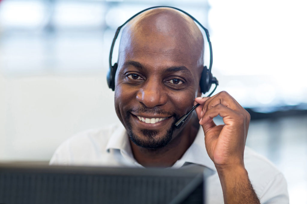 Person on a headset talking with a customer